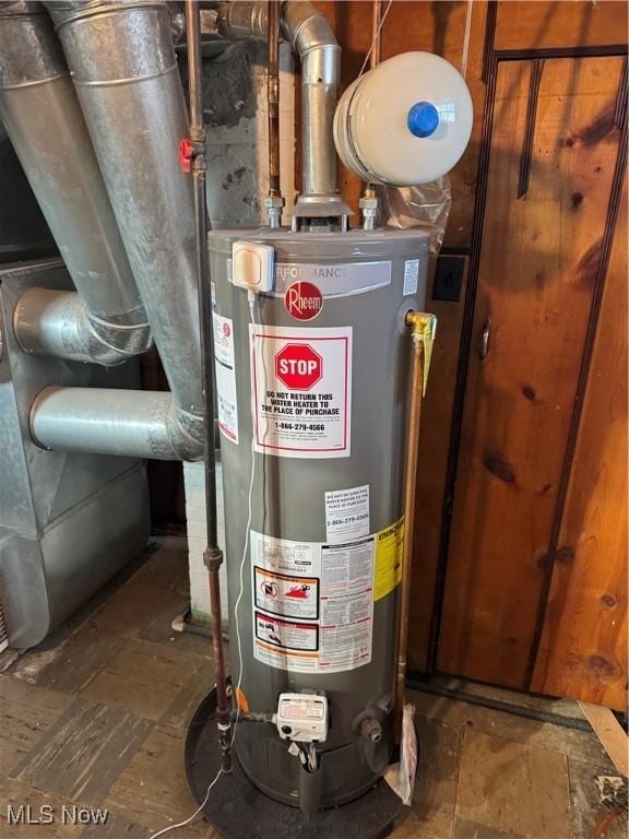 utility room with gas water heater