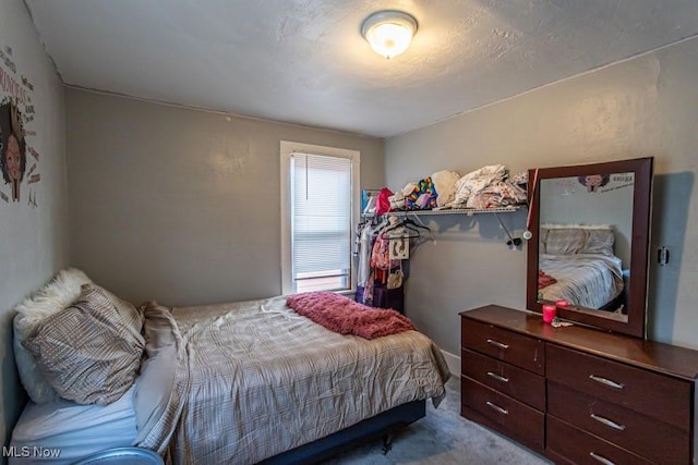 bedroom featuring carpet flooring