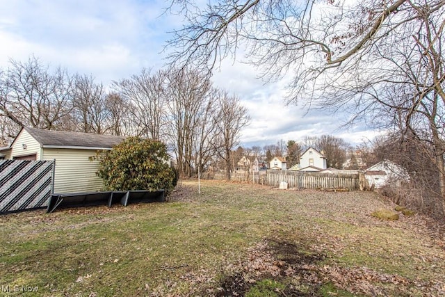 view of yard with fence