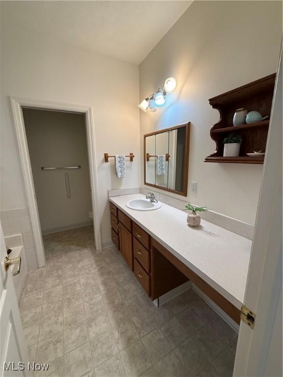 full bathroom with vanity