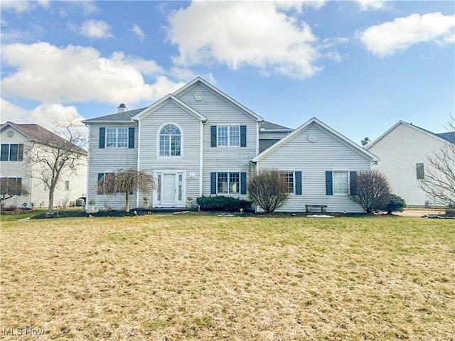 view of front of home with a front yard