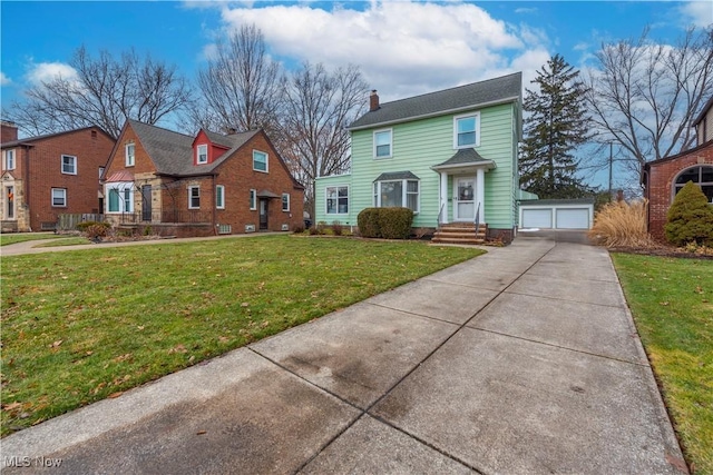 view of front of property with a front yard, a detached garage, a chimney, and an outbuilding