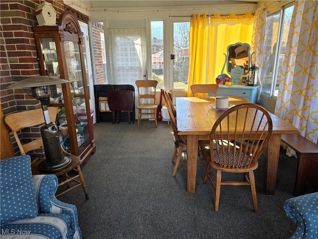 view of carpeted dining area