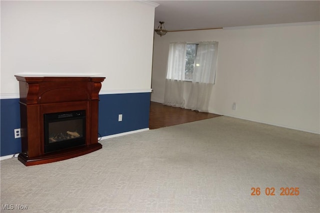 255 N Portage Path Unit 208, Akron, OH 44303 - unfurnished living room featuring carpet flooring, a glass covered fireplace, ornamental molding, and baseboards