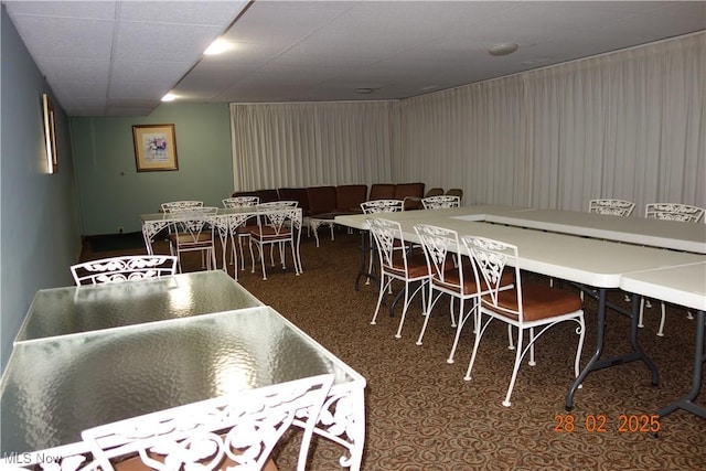 255 N Portage Path Unit 208, Akron, OH 44303 - dining space featuring a drop ceiling and carpet flooring