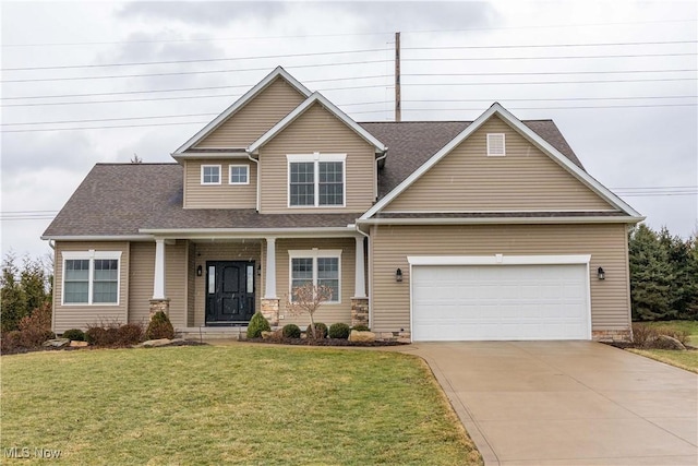 craftsman-style house with a garage, concrete driveway, a front lawn, and roof with shingles