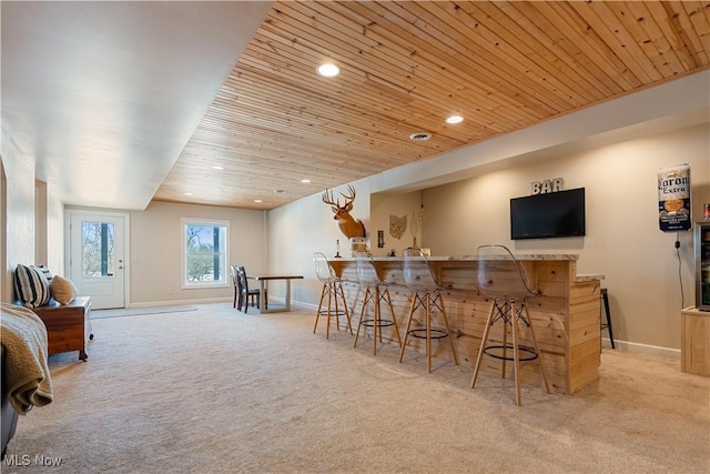 bar with carpet, wooden ceiling, baseboards, and recessed lighting