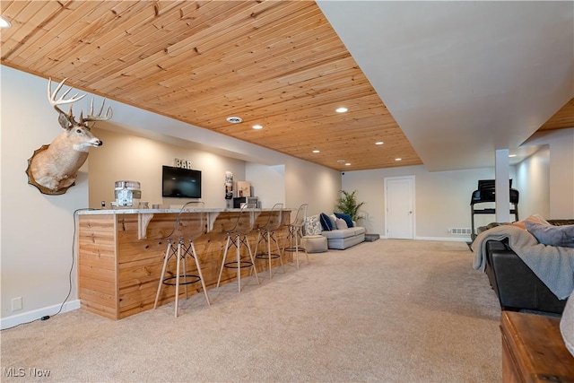 bar featuring carpet, indoor wet bar, wooden ceiling, and recessed lighting