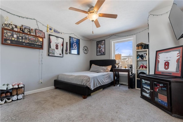 bedroom with carpet floors, baseboards, and a ceiling fan