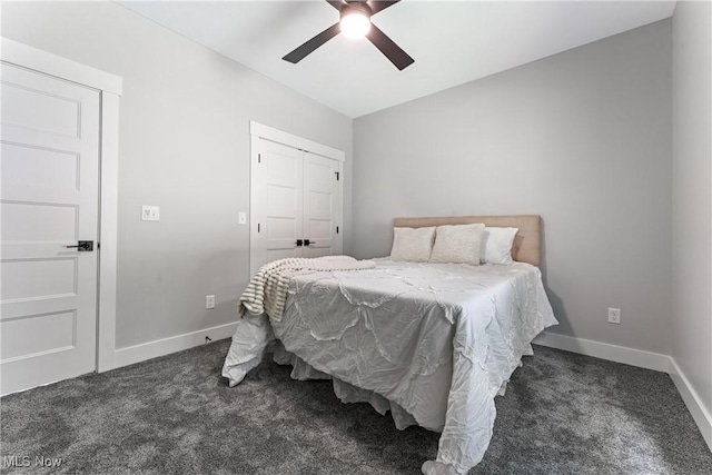 carpeted bedroom featuring a closet, a ceiling fan, and baseboards