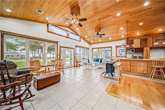 living area with high vaulted ceiling, wooden ceiling, light tile patterned flooring, recessed lighting, and visible vents