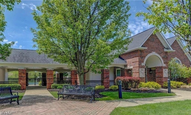 view of property's community featuring a gate