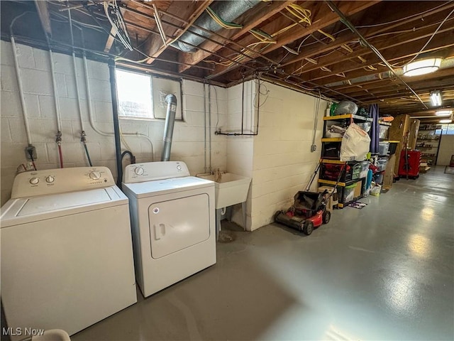 laundry room featuring a sink, laundry area, and washer and dryer