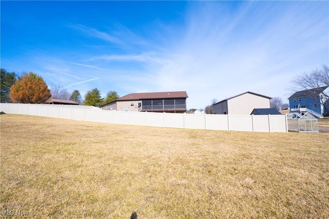 view of yard featuring fence