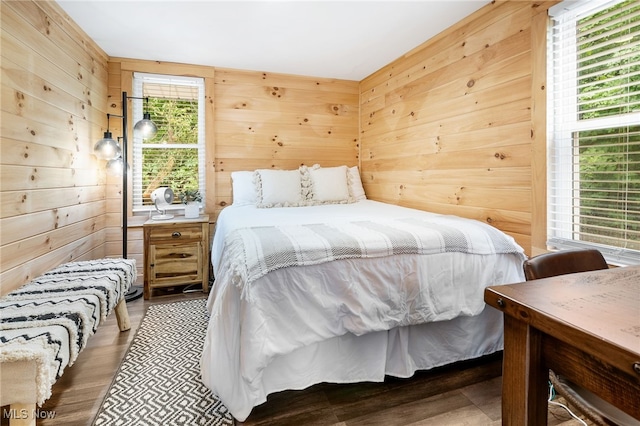 8950 County Road 292, Millersburg, OH 44654 - bedroom featuring wood walls and wood finished floors