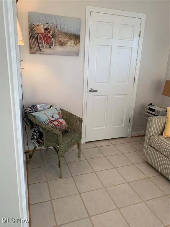 interior space with light tile patterned floors