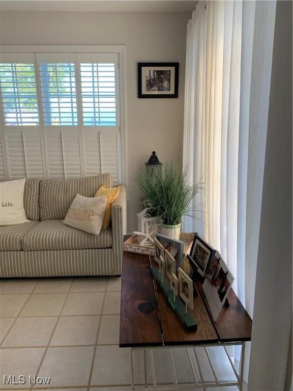 living area featuring light tile patterned floors