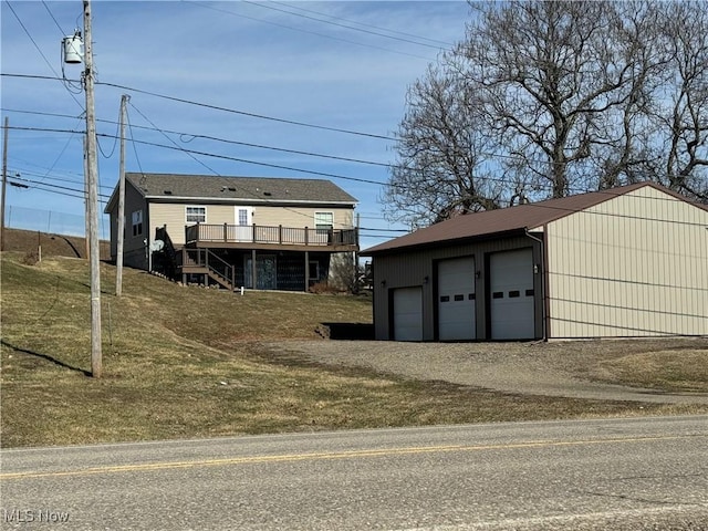 view of outbuilding featuring an outbuilding and stairs