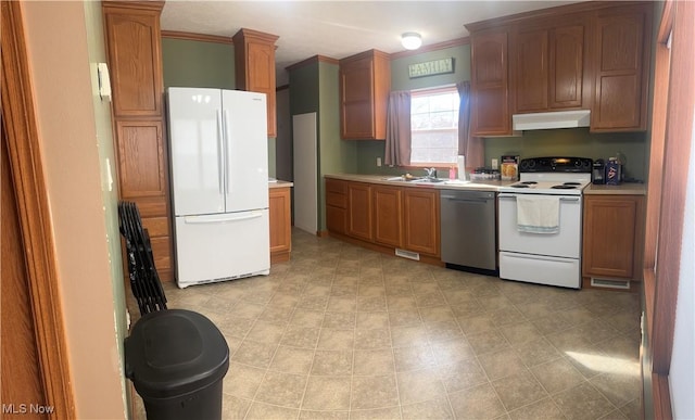 kitchen with white appliances, under cabinet range hood, visible vents, and light countertops