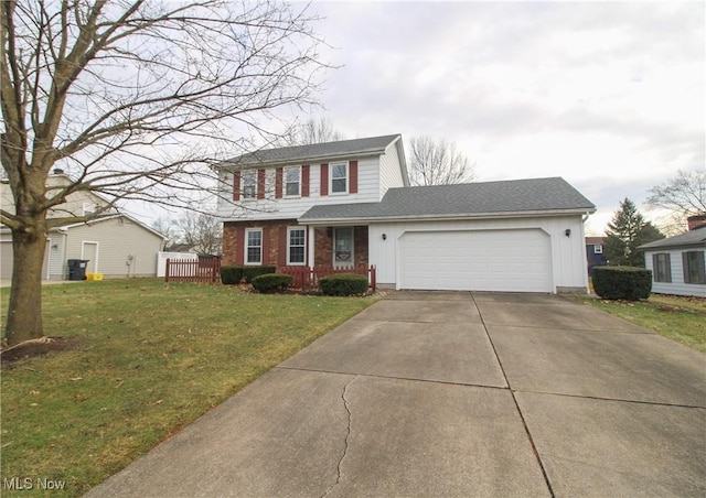 view of front of home featuring a garage, concrete driveway, a front lawn, and roof with shingles