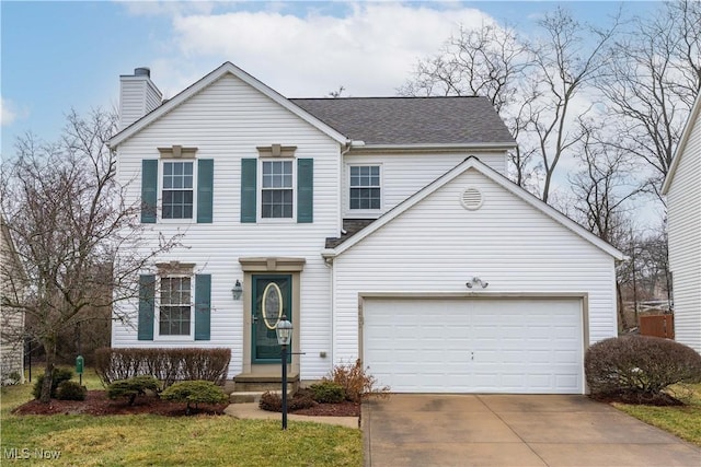 traditional-style house featuring a garage, driveway, a chimney, and a shingled roof