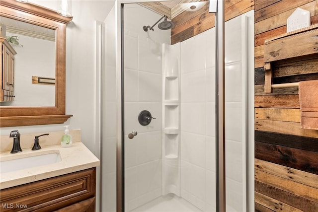 full bathroom featuring a stall shower and vanity