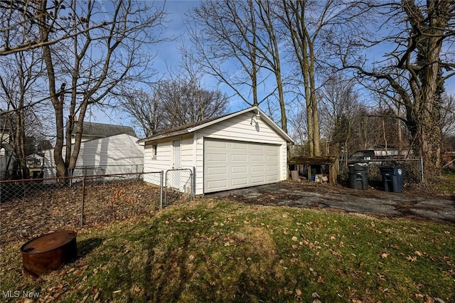 detached garage with fence