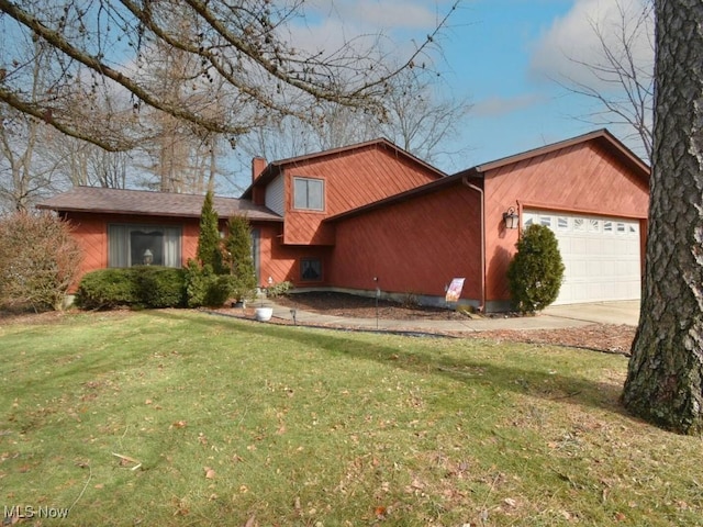 view of front facade featuring driveway, a front lawn, a chimney, and an attached garage