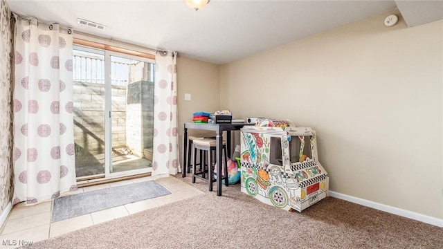 playroom with carpet, tile patterned flooring, visible vents, and baseboards