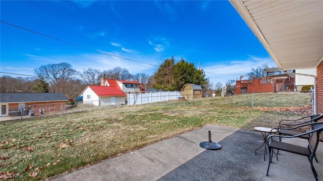 view of yard with a patio and fence