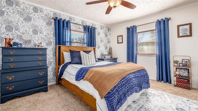 bedroom featuring wallpapered walls, baseboards, light colored carpet, ornamental molding, and a textured ceiling