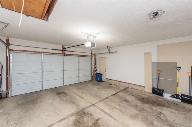 garage featuring a garage door opener