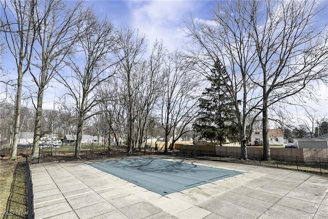 view of pool with a patio, fence, and a fenced in pool