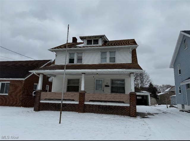 traditional style home with a porch