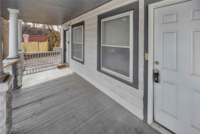 wooden deck featuring a porch