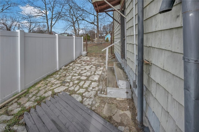 view of side of property with fence