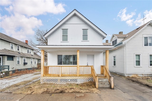 view of front of home with covered porch and board and batten siding