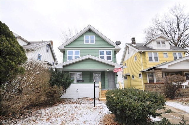 view of front of property featuring covered porch