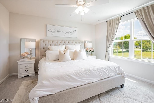 bedroom featuring carpet flooring, ceiling fan, and baseboards