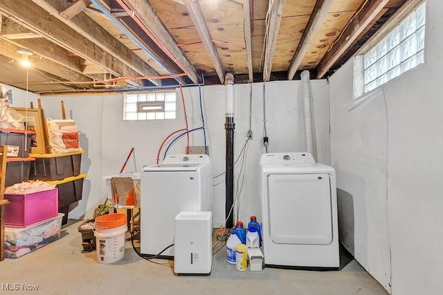 laundry area with laundry area and separate washer and dryer