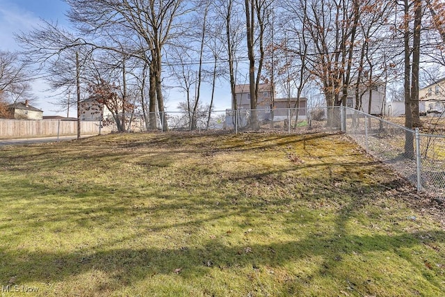 view of yard with fence