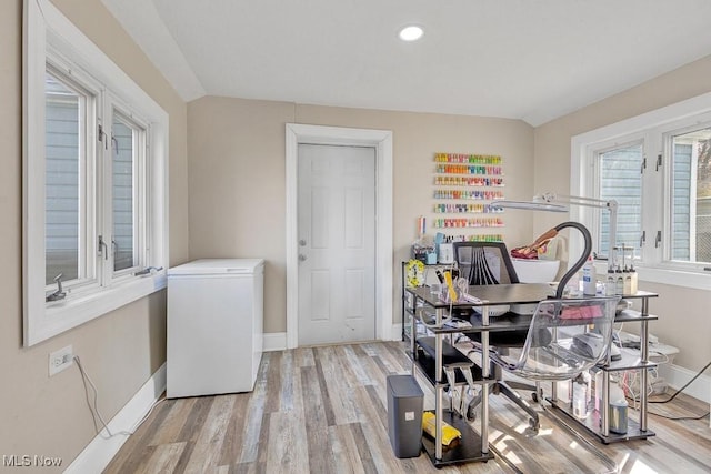 interior space with recessed lighting, light wood-style flooring, and baseboards