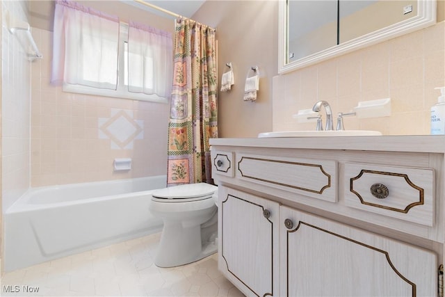 bathroom featuring shower / tub combo, vanity, toilet, and tile patterned floors