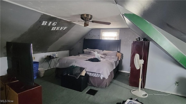 bedroom featuring a ceiling fan, vaulted ceiling, and carpet flooring