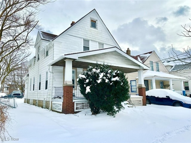 traditional style home with covered porch