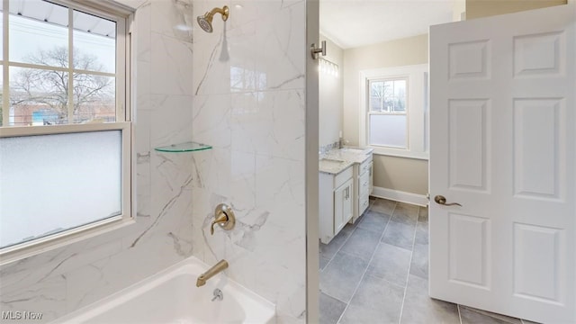 full bath with shower / bathing tub combination, vanity, and baseboards