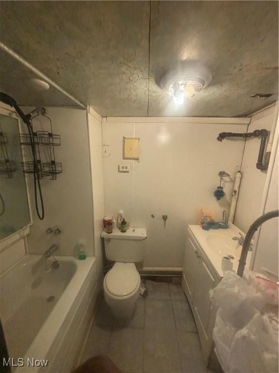 bathroom with tile patterned flooring, vanity, toilet, and bathing tub / shower combination