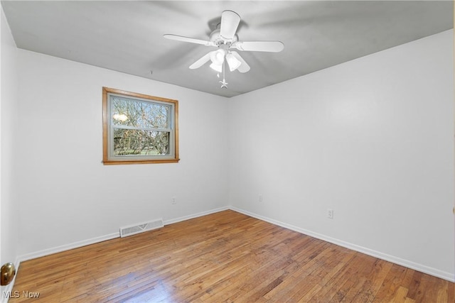 8173 Spencer Ave NW, North Canton, OH 44720 - spare room featuring ceiling fan, light wood-style flooring, visible vents, and baseboards