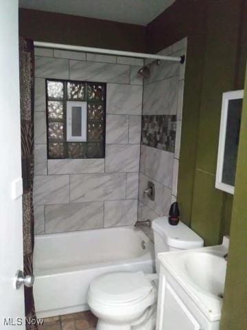 full bath with toilet, bathtub / shower combination, and vanity