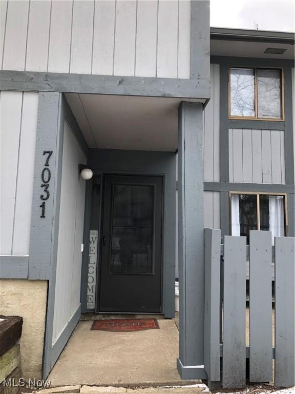 entrance to property with board and batten siding